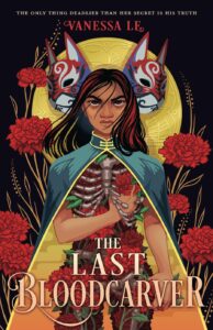 Illustrated cover for The Last Bloodcarver. A teenage girl with light brown skin on her face and arms has a body made up of pipe-like bones and what look like red carnations. Her right hand has gone through her left ribs, so she can grip the flowers underneath. She looks like she might pull them out. She is wearing a green cape with a gold lining and stands in a field of more of the red flowers and has shoulder-length black hair with red highlights. A golden full moon hangs behind her, as well as a pair of red, white, and black masks with long, pointed ears. 