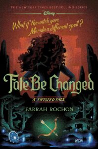 Illustrated book cover. There is a young woman with curly red hair centered, but the lighting makes it so details of her facial features are in shadow. She has hands on her hips. In the background there is a castle. Below her is a forest with a bow and arrow, shield and crown on the ground. What if the witch gave Merida a different spell is written above her. A twisted tale is written below the title Fate be Changed.