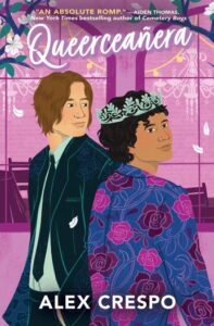 Illustrated cover of Queerceañera. Two teenage boys pass by each other. The one in front is wearing a light blue crown of stylized leaves and a blue suit jacket with red and pink roses on it. He has medium brown skin and short, curly, dark brown hair, and he's glancing over his shoulder at the viewer. The boy in the back is looking at the first boy as he passes, and he is wearing a black suit and tie with a white shirt, but on closer inspection the lining of his jacket and less obviously his shoulders have roses on it as well. He has lighter skin and longer and lighter brown hair, with a bit of a wave. Behind the is what appears to be a fancy party space with chairs, tables, chandeliers, and lights. White flower petals fall around them both from the flowering tree branches overhead.