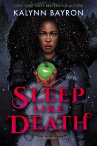 A young Black woman wearing armor is holding out a green apple with one hand.