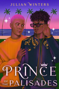 Illustrated cover of Prince of the Palisades. Two Black teenage boys stand together with a Los Angeles beach and palm trees in the distance behind them. The light suggests it is just after sunset. One boy has short cropped pink hair and wears a yellow sweater. He has his had on the other boy's upper arm. The second boy is wearing sunglasses and is wearing a dark blue with gold embroidery. His hair is shaved on the sides with longer curls up top. The boys are looking at each other fondly.