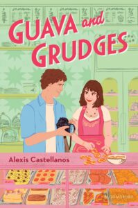 Illustrated cover of Guava and Grudges. Two teenagers stand close together at a bakery counter, smiling at each other. The boy is wearing an open blue button up and white undershirt, and he has a black camera in his hands. The girl is wearing a white t-shirt and pink apron while she forms some pastries.