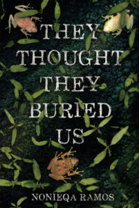 Illustrated cover for They Thought They Buried Us. The cover shows a view from above of three green-yellow-brown frogs on dark, mossy ground. There are fallen leaves and what looks like seedlings scattered all around. The frogs are arrayed loosely in a triangle, so they look like they're watching each other.