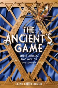 The cover of The Ancient's Game also includes the words Three Trials. Two Worlds. One Survivor. There is a blue silken material in the background that has a golden or bronze looking grating in diamonds and triangles. There is a shiny gold spider in the top right corner.