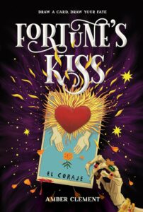 A dark cover with a skeleton hand holding a card. The card says el coraje and has two hands above an orange flower with a big red heart above the hands that has feathers or flames all around it. The background looks like a dark sky with stars.