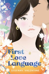 Young woman with white skin and a blush on her cheek is staring out. Next to her and blocking part of her face is the profile of a young man with light brown skin and closed eyes. Around the edges of the book are many flowers. 