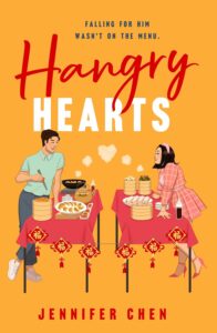 Illustrated cover with a light orange background. There are two tables with red table cloths. There are square red decorations hung like a diamond with gold written characters and there are red tassles hanging from them. There is a young man with dark hair standing at one table facing the young woman standing at the other table. There are steam baskets on both talbles. He also has dumplings on a platter. She has rolled food on a platter. There are puffs of steam coming up from the food on each table that meets together between the tables in a heart shape. The two people are smiling at each other. The tag line Falling for him isn't on the menu is written about the title hangry hearts.