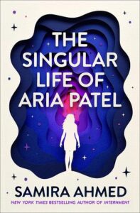 The cover of The Singular Life of Aria Patel is mostly white with little stars scattered about. In the center is a dark blue almost cave like feature with the white outline of a young woman heading into the colors. 
