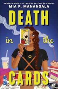 Cover of the book death in the cards. A young light skinned woman with long brown hair is holding up a card to cover one side of her face. On the card is half of a skeletal head. There is an iced coffee in a plastic cup to the left and a dish with a burning piece of incense on the right. She has here mouth and eyes open wide in a show of astonishment. 