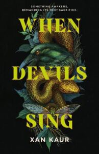 Cover of When Devils Sing has the title in yellow letters and there is a snake and large bug on leaves behind the title. The background is black.