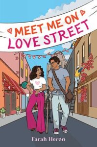 The book cover of meet me on love street. A young man and woman are walking down the street with a bicycle between them. There is a banner above them with the title. She's wearing hot pink flared pants and a white t with a heart on it. He's wearing glasses and has a cross body bag and is wearing jeans and a tshirt. 