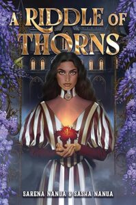 Book cover for A Riddle of Thorns. A young woman with brown skin and long dark hair stares out at the reader. She's wearing a low cut striped dress with long sleeves. She is holding her hands together in front of her and there is a red flower above her hands. She has a choker on her neck that is white and burgundy striped like her dress. Behind her is a building with windows that show lights on inside. There are purple flowers on either side of her.