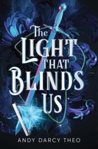 Illustrated cover for The Light that Blinds Us. What looks like a large, triangular pendant made of metal and glass has light bursting out of glass and shattering the chains binding it to the hilt of a sword. It feels like we're at the very start of an explosion.