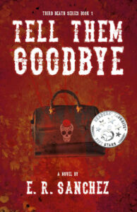 The book cover for tell them goodbye has a rusty reddish background. There ias a leather back with a skull on it. The skull has eye sockets that are flower shaped. The nose cavity is shaped like an upside down heart and there is a design on the forehead like paper picador cuts. There is an also a red or dark orange flower or hat on the skull. There is a silver Reader's Favorite five stars award on it.