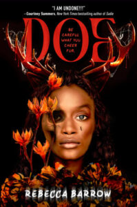 The book cover of Doe. It is a dark cover with an almost glowing face of a young Black woman. On the right side she has a blue eye, but the other eye is very dark in a shadow or is blackened. She has antlers on her head. There are flowers in front of her dark eye and they are fiery colors. In the large O of the title it says be careful what you cheer for.