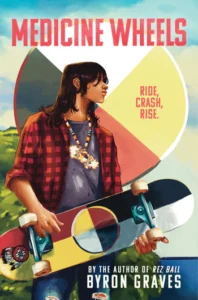 Book cover for medicine wheels. A young man with light brown skin and shoulder length brown hair is carrying a skateboard with the wheels facing out. On the bottom the board is covered in the colors red, yellow, black and white in fourths. There is also a circle in the center that has the same colors and the outside edge of the circle has white on the edge of the yellow, yellow on the red, red on the black, and black on the white. The young person is wearing a red and black plaid shirt over a tshirt and has a beaded necklace. Behind him is another medicine wheel. On the yellow portion red words say ride, crash, rise.