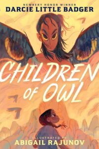 The book cover of Children of Owl is mostly light yellows with a bit of orange tint. At the top is a being with a long thin face and large eyes. Their hair is brown, shoulder length, and is blowing in the breeze. They seem to have dark wings that also have eyes. At the bottom of the cover is a very young girl with a braid who is looking up and to the right. There is a mountain in the background and a few birds in the sky.